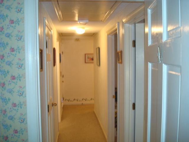 208 Bumps River Road Osterville, MA 02655 - Photo 15 of 16 a view of a bathroom from a hallway
