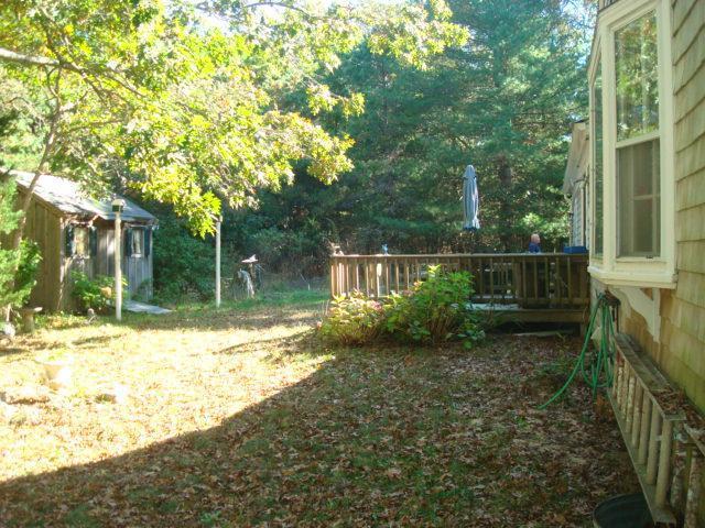 208 Bumps River Road Osterville, MA 02655 - Photo 16 of 16 a view of backyard with green space