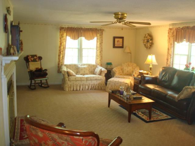 208 Bumps River Road Osterville, MA 02655 - Photo 5 of 16 a living room with furniture and a window