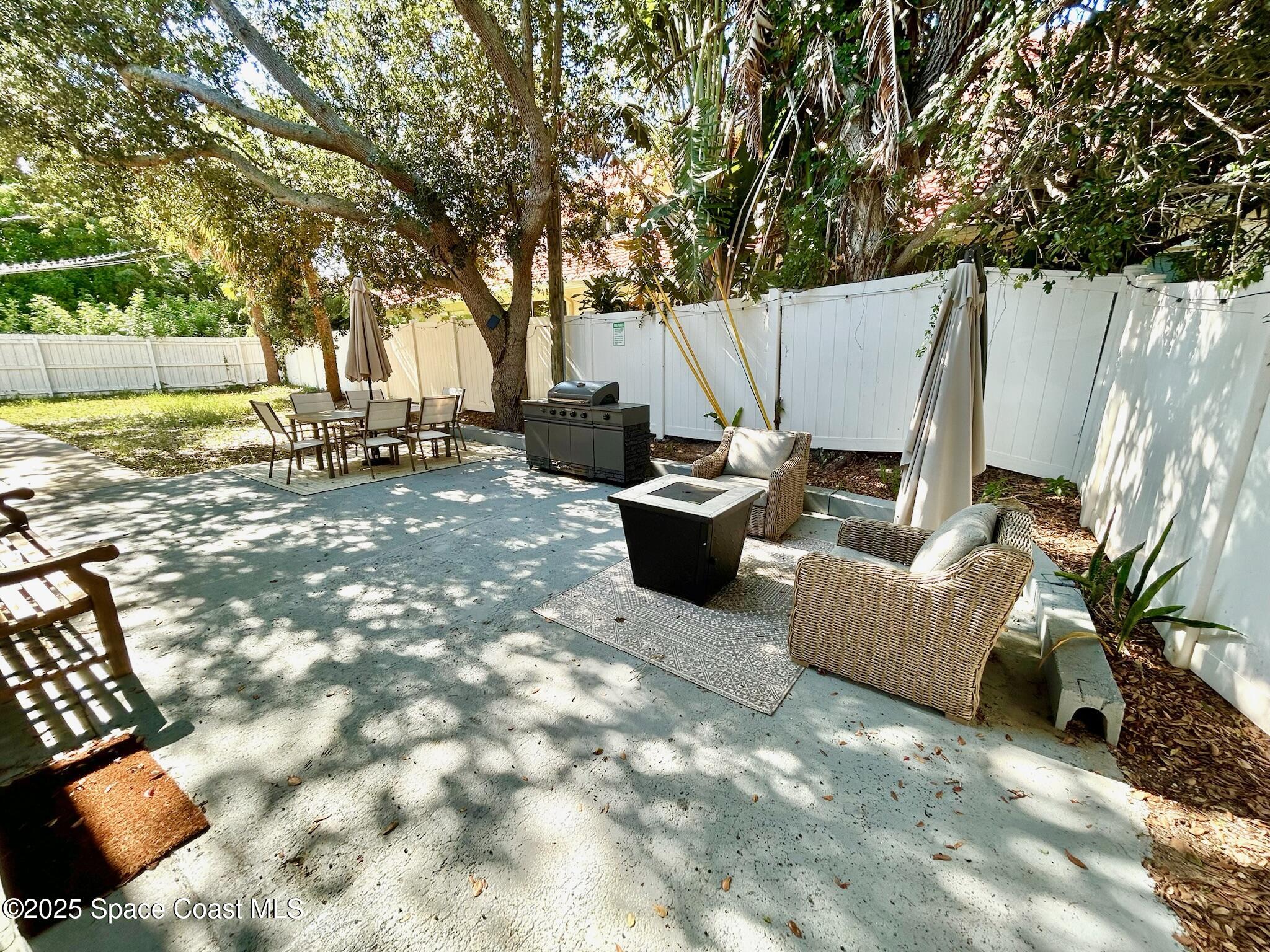 8110 Canaveral Boulevard, Unit 3 Cape Canaveral, FL 32920 - Photo 7 of 25 a view of outdoor space yard and patio