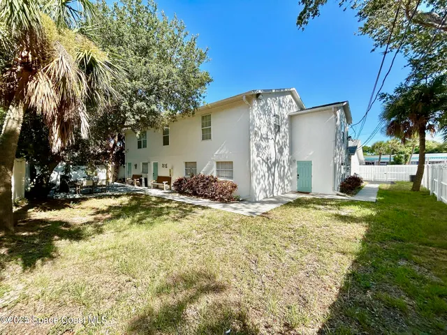 a house view with garden space