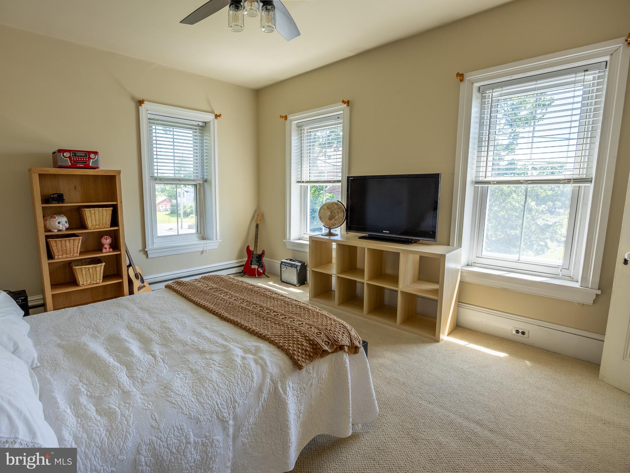 225 Niantic Road Barto, PA 19504 - Photo 56 of 82 a bedroom with a bed and a flat screen tv