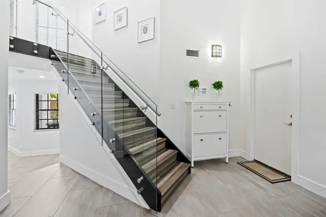 a view of entryway with stairs