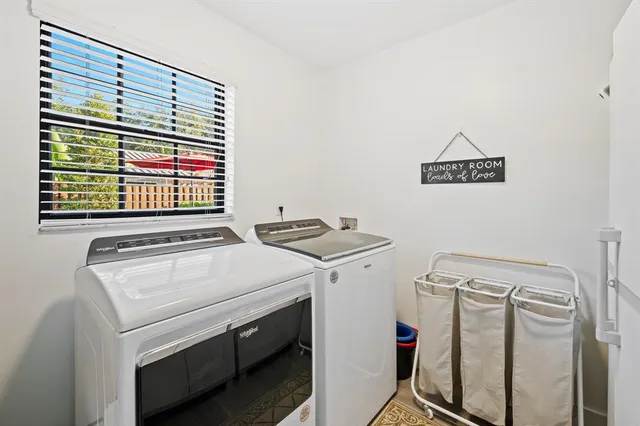 a utility room with dryer and washer