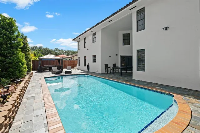 $1,549,900 | 8340 Northwest 167th Terrace, Miami Lakes, FL 33016