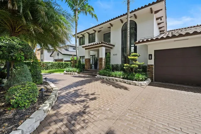 a view of a street with a building in the background