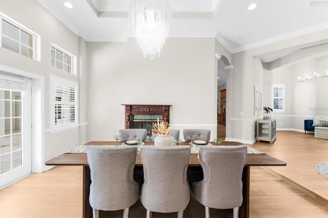a bedroom with a large bed and a large window