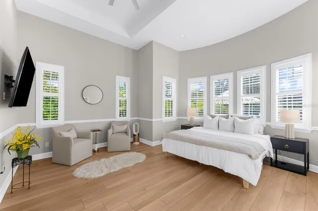 a large kitchen with granite countertop a refrigerator and a sink