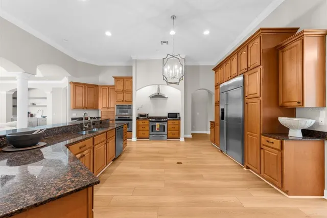 a bathroom with a toilet sink and shower