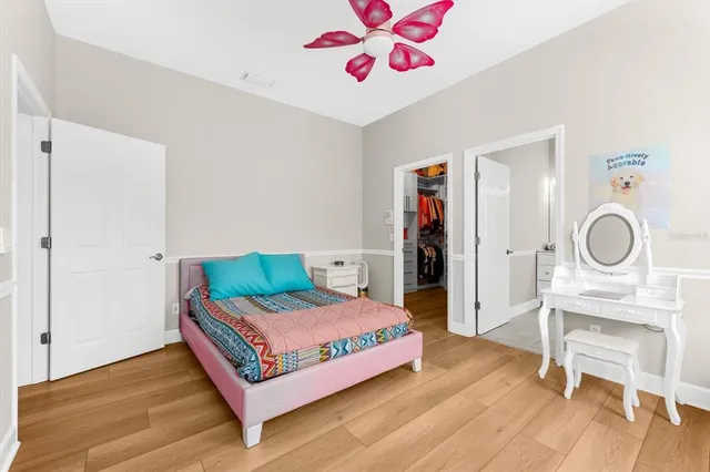 an aerial view of swimming pool with a yard