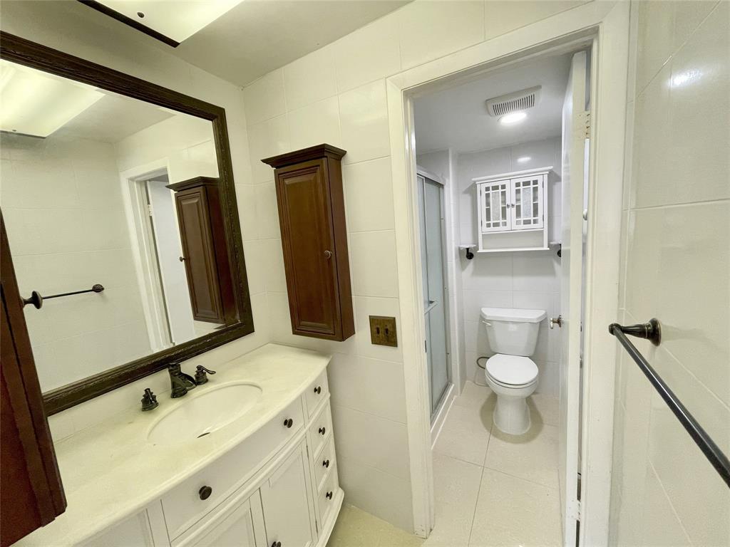 5090 Southwest 64th Avenue, Unit 204 Davie, FL 33314 - Photo 11 of 25 Updated en-suite primary bathroom