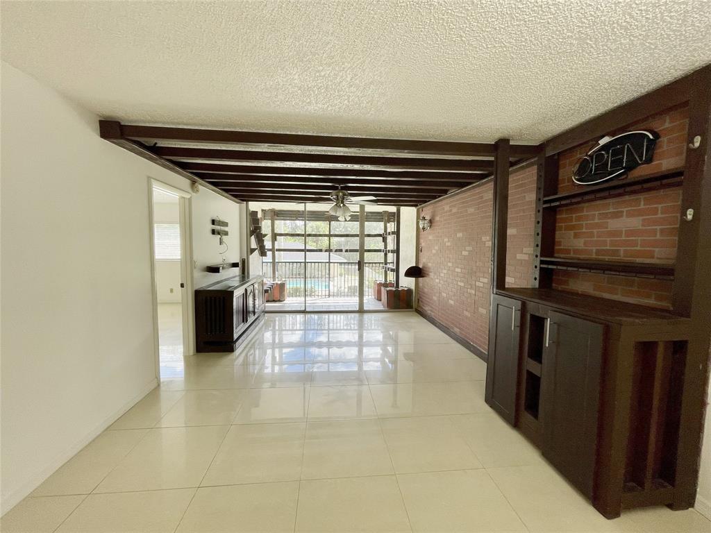 5090 Southwest 64th Avenue, Unit 204 Davie, FL 33314 - Photo 5 of 25 Open concept floor plan with plenty of natural light