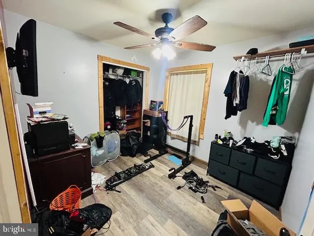 a room with gym equipment and a mirror