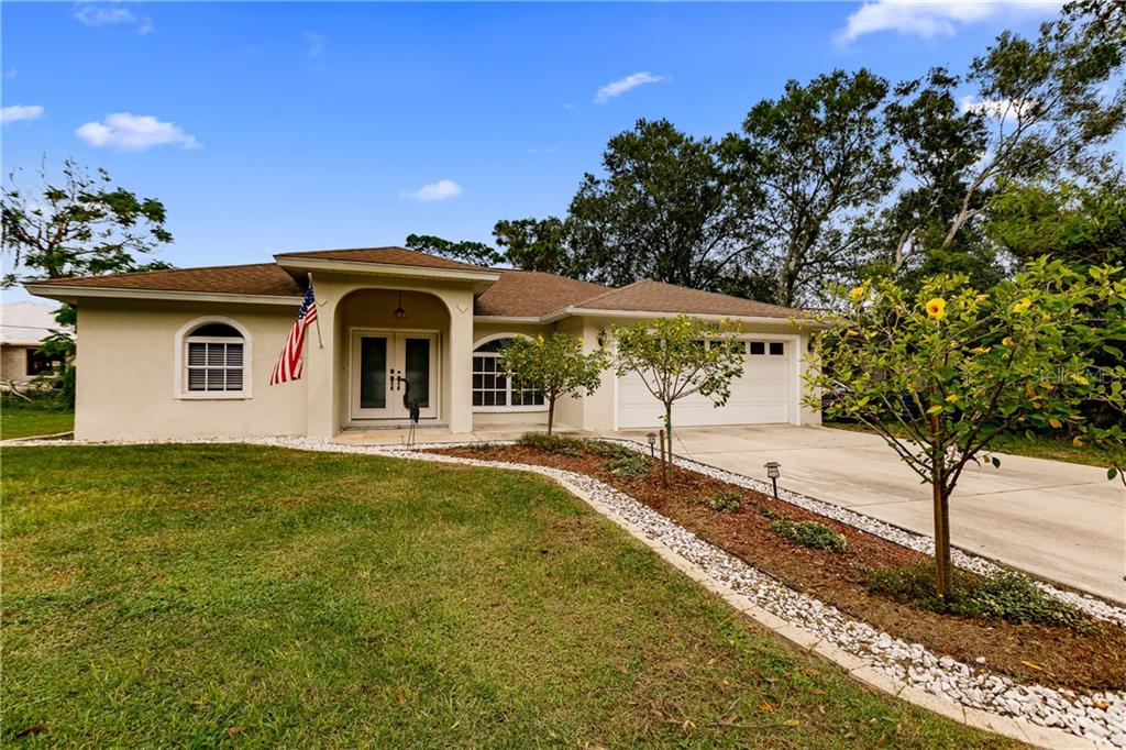 623 Constance Road Venice, FL 34293 - Photo 1 of 1 a front view of a house with garden
