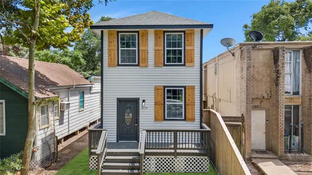 a view of a house with many windows