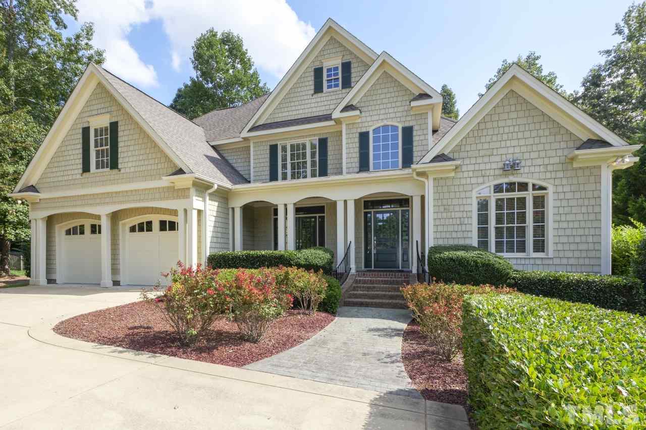 1417 Wynncrest Court Raleigh, NC 27603 - Photo 1 of 25 a front view of a house with a yard