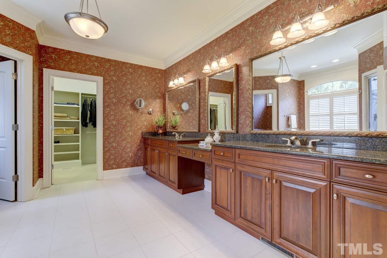 1417 Wynncrest Court Raleigh, NC 27603 - Photo 11 of 25 a large bathroom with a large tub and sink