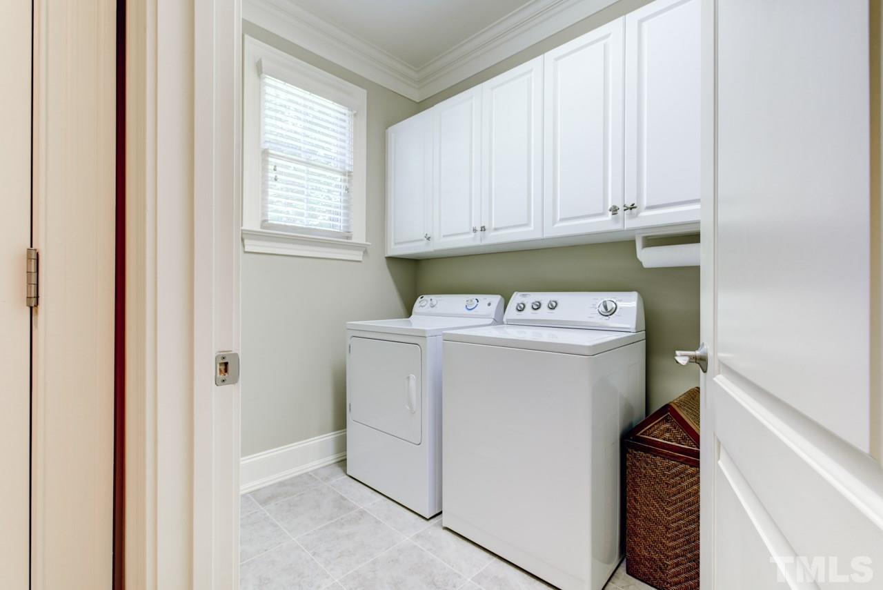 1417 Wynncrest Court Raleigh, NC 27603 - Photo 13 of 25 a utility room with dryer and washer