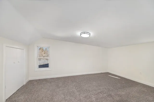 an empty room with a workbench