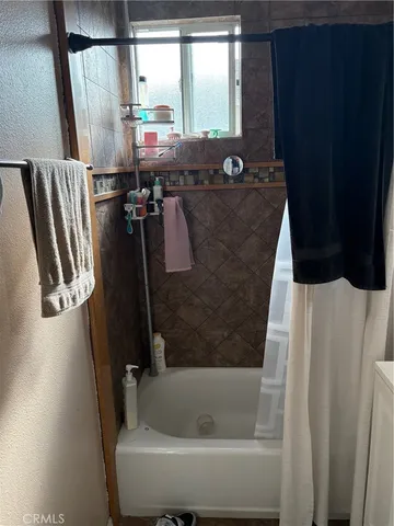 a bathroom with a bathtub