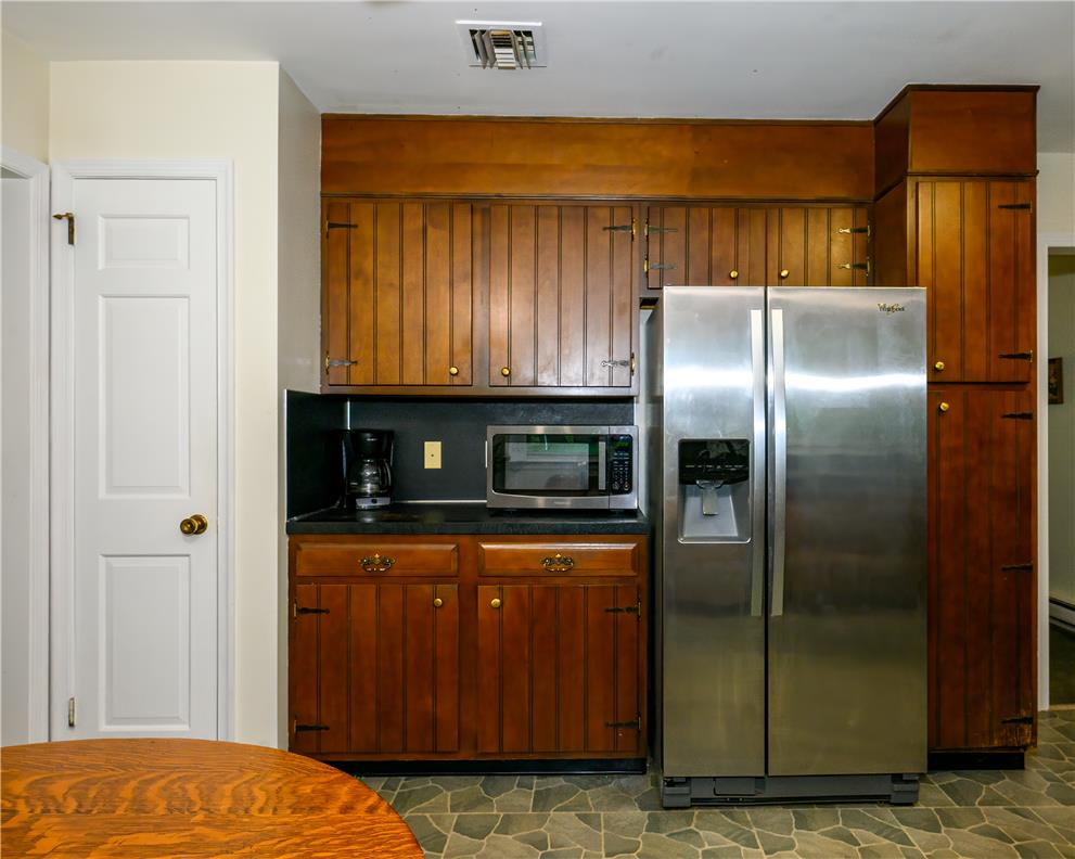 2516 Rachael Lane Orefield, PA 18069 - Photo 8 of 45 Functional kitchen with timeless wood cabinetry and modern stainless steel appliances.