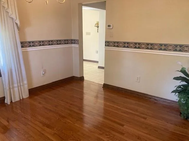 a view of a hallway with closet