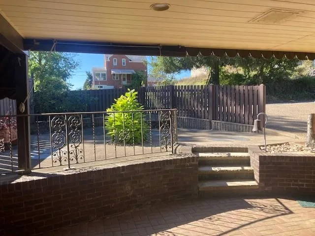 a garden view with a seating space