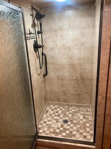 a utility room with sink dryer and washer