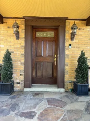 a view of a building with sitting area