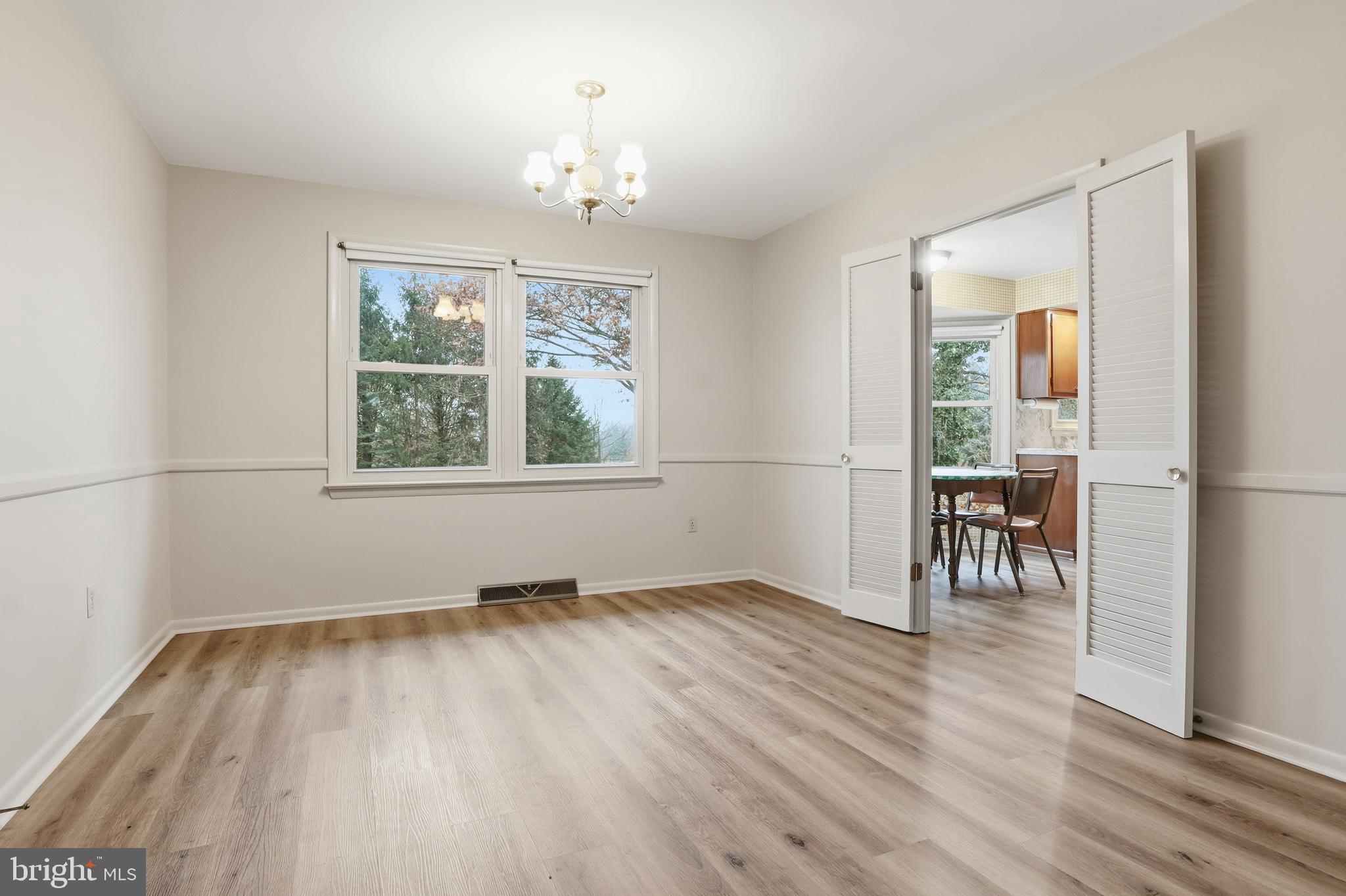2113 Huntington Road Dover, PA 17315 - Photo 11 of 50 a view of empty room with wooden floor and fan