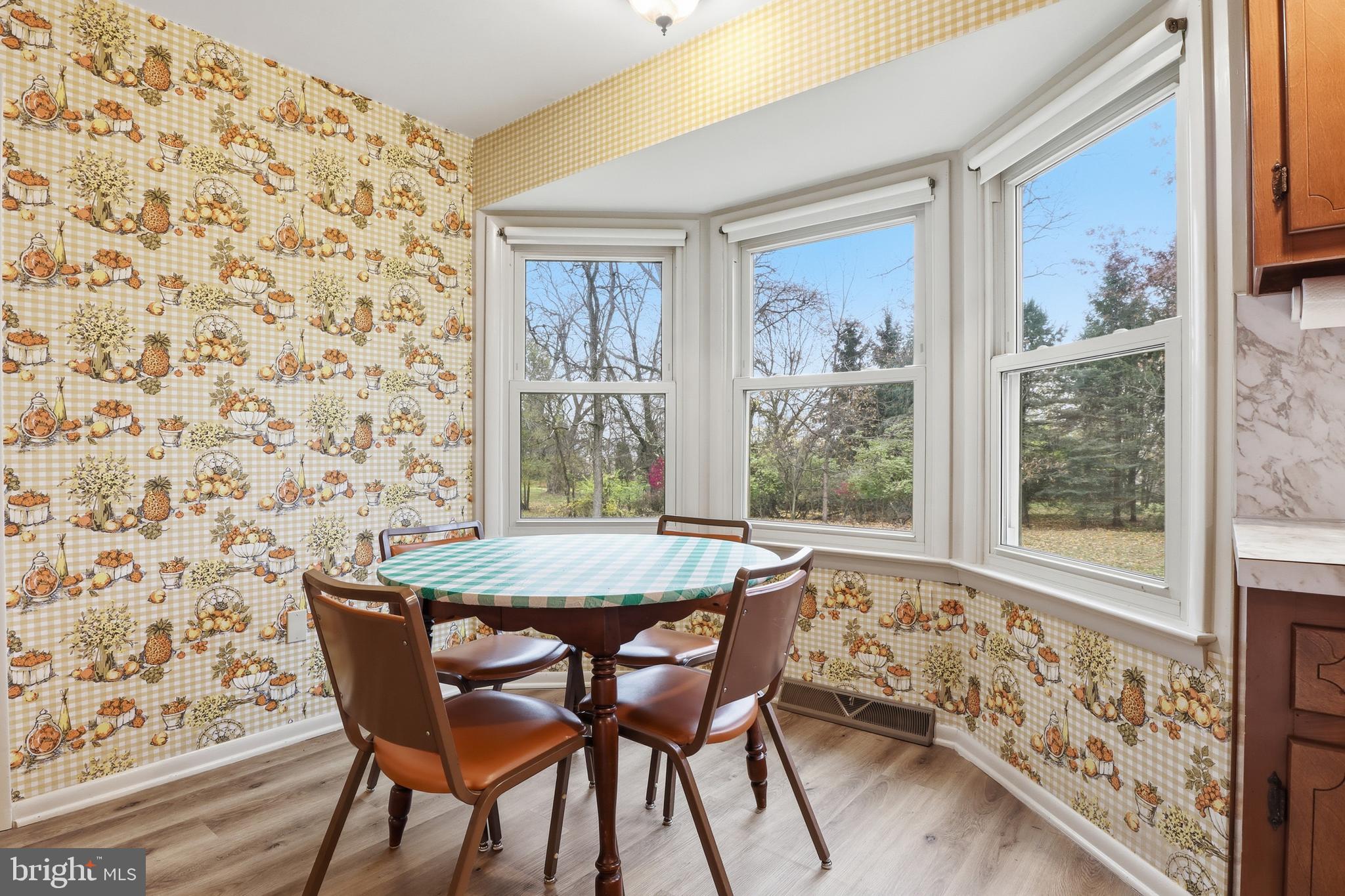 2113 Huntington Road Dover, PA 17315 - Photo 17 of 50 a dining room with furniture and wooden floor