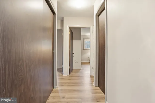 a view of a bathroom from the hallway