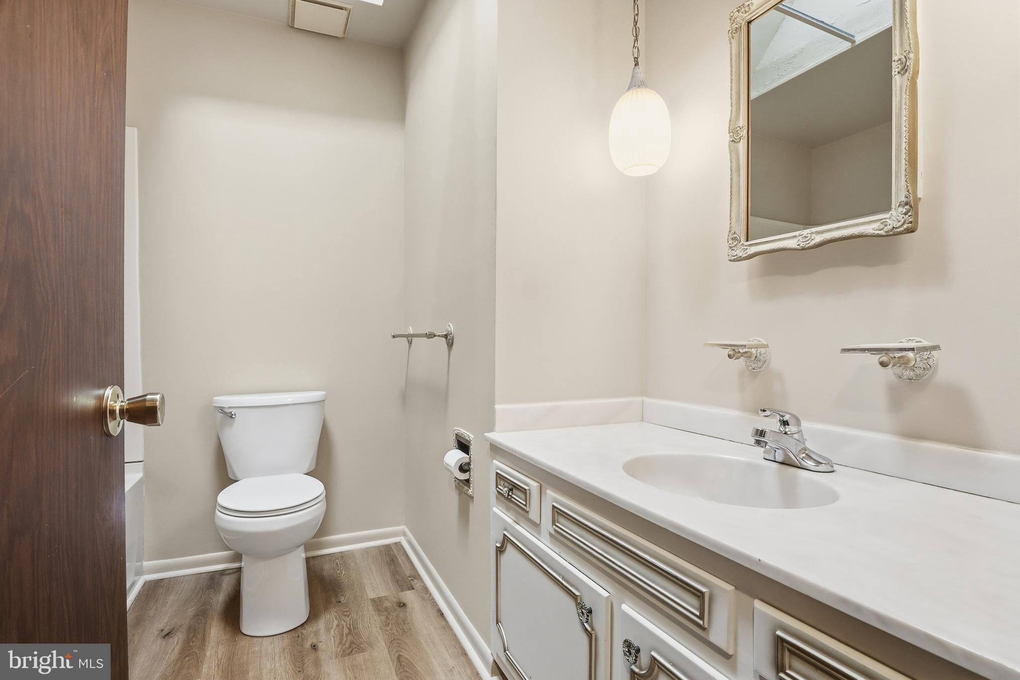 2113 Huntington Road Dover, PA 17315 - Photo 25 of 50 a bathroom with a sink a toilet and a mirror