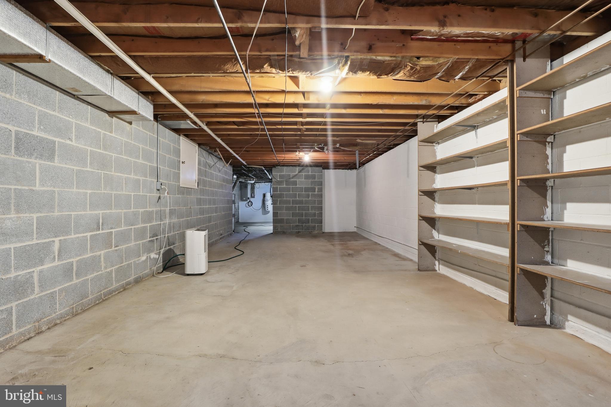 2113 Huntington Road Dover, PA 17315 - Photo 37 of 50 a view of an empty room with white walls and stairs