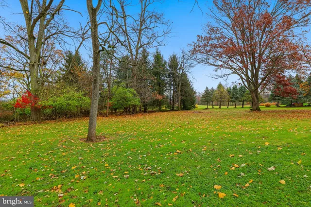 a front of a house with a garden