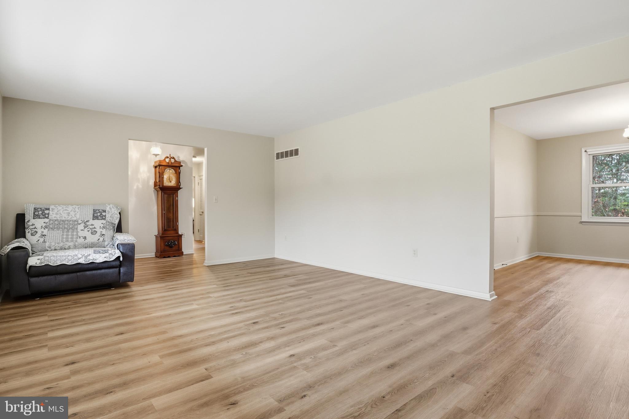 2113 Huntington Road Dover, PA 17315 - Photo 10 of 50 a view of a livingroom with wooden floor and a couch