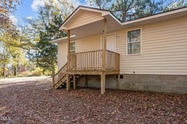 a view of balcony with wooden floor