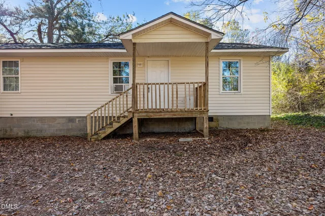 a house view with a backyard