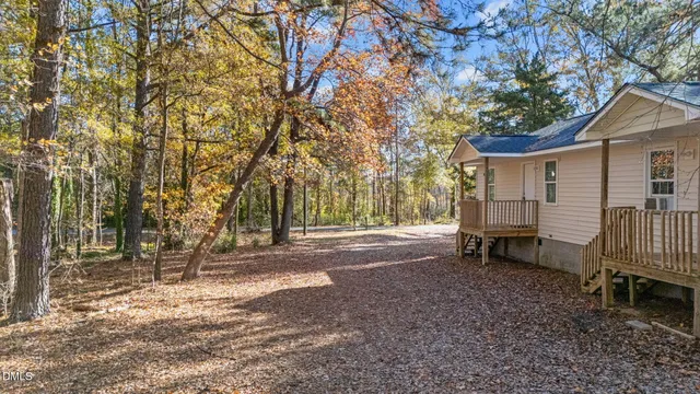 a view of balcony with wooden fence