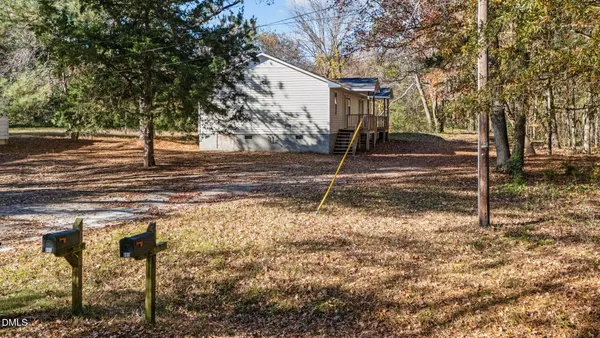 a room with furniture and wooden floor