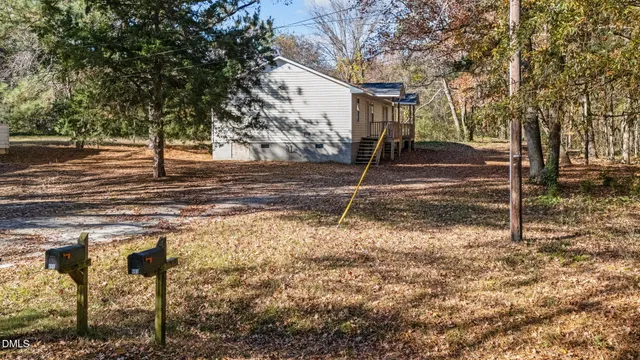 a room with furniture and wooden floor