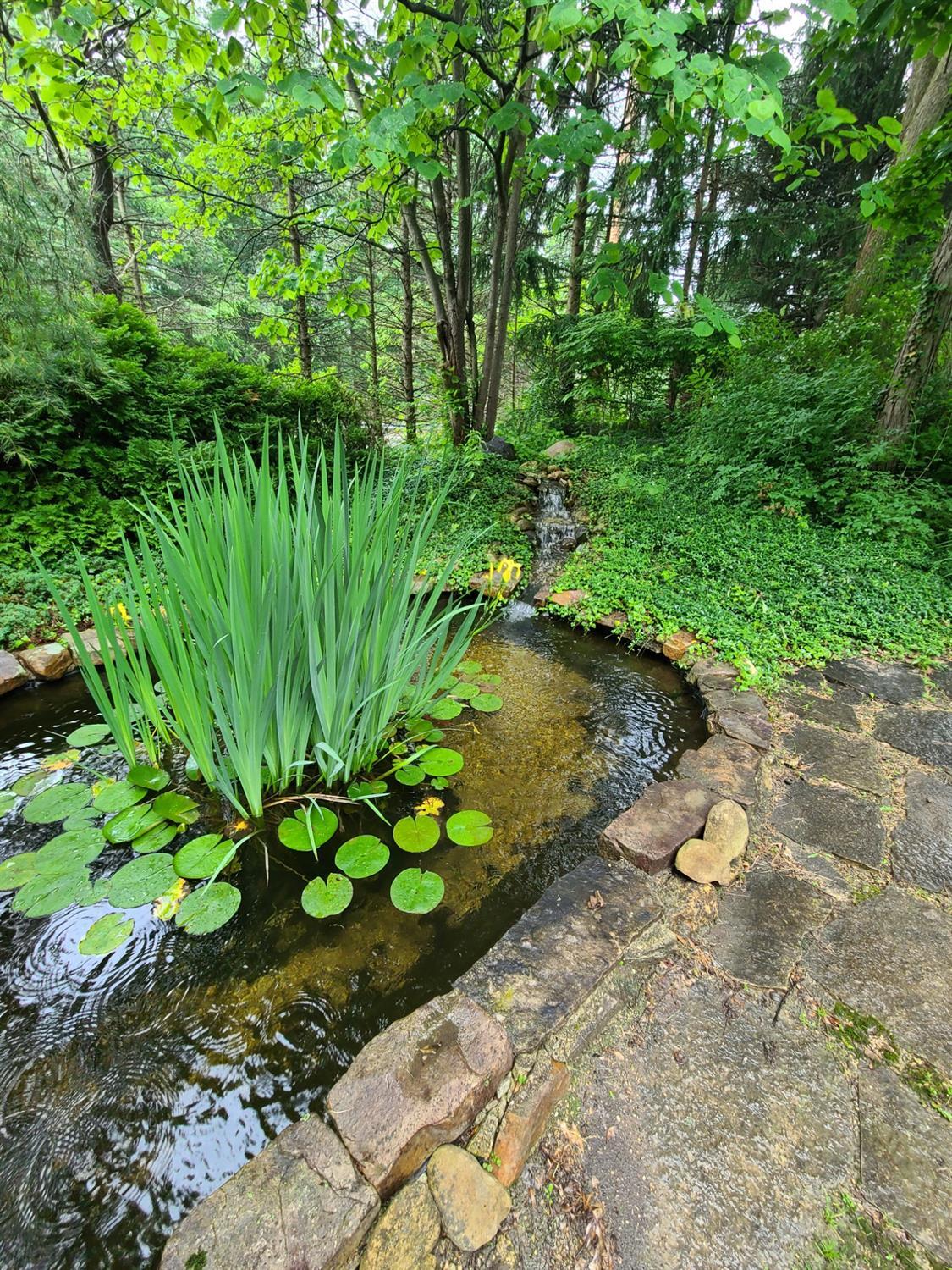 3151 Boone Grove Road Valparaiso, IN 46385 - Photo 11 of 37 a view of a garden with a tree