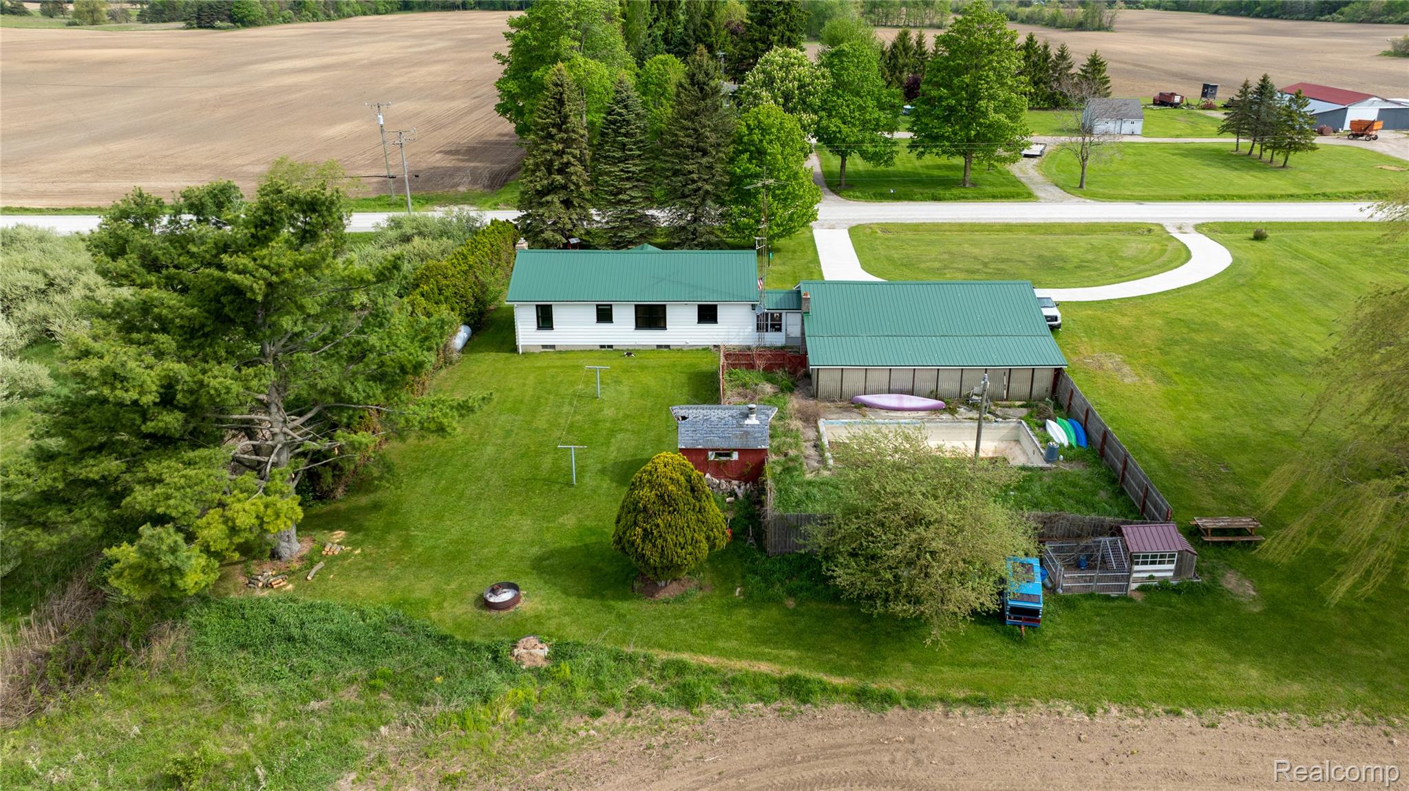 6373 Norman Road Jeddo, MI 48032 - Photo 31 of 32 View from above of property featuring a tree filled landscape