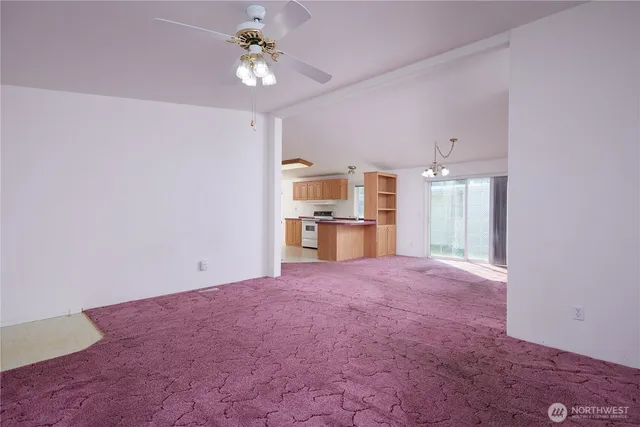 a view of a kitchen with a sink and a kitchen