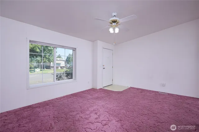 a very nice looking room with a large window