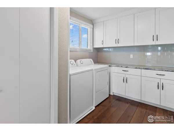 a view of cabinets with wooden floor
