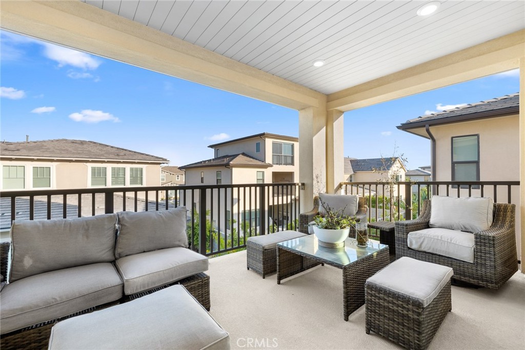70 Ray Irvine, CA 92618 - Photo 23 of 41 a balcony with furniture and a potted plant