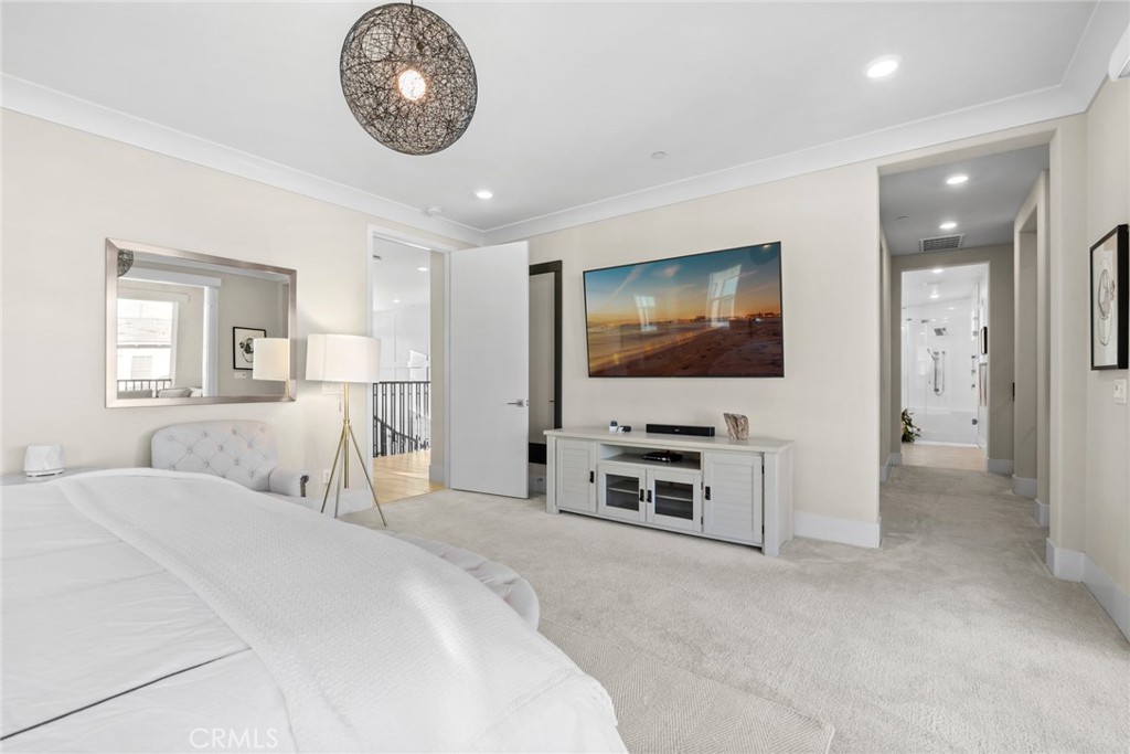 70 Ray Irvine, CA 92618 - Photo 24 of 41 a bedroom with furniture and a flat screen tv