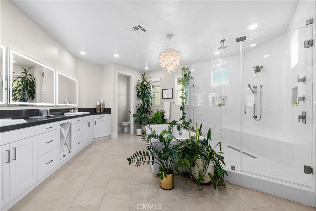 70 Ray Irvine, CA 92618 - Photo 26 of 41 a large white kitchen with granite countertop a white plant