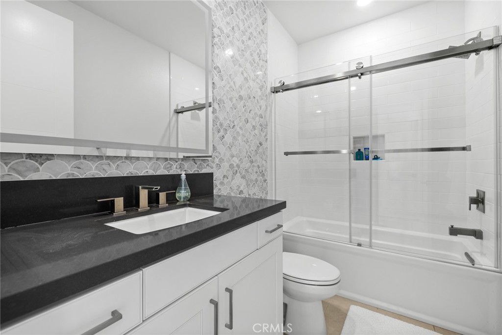 70 Ray Irvine, CA 92618 - Photo 29 of 41 a bathroom with a sink a toilet and shower